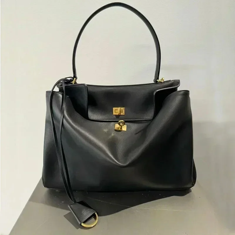 Luxury Gold Lock Designer Hand - đánh giá và giá Leatherwork Designs