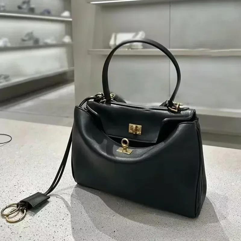 Luxury Gold Lock Designer Hand - đánh giá và giá Leatherwork Designs